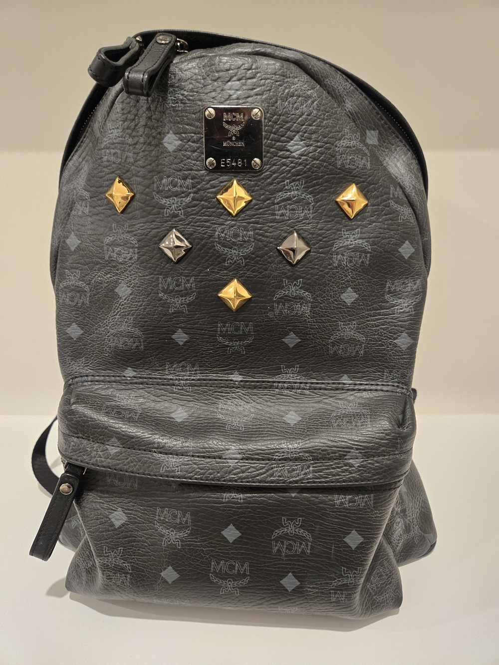 MCM Black Leather Logo Backpack with Gold & Silver Studs